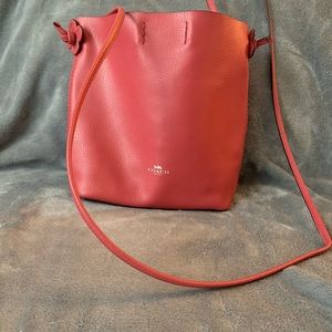 Small, pink, Coach crossbody purse
